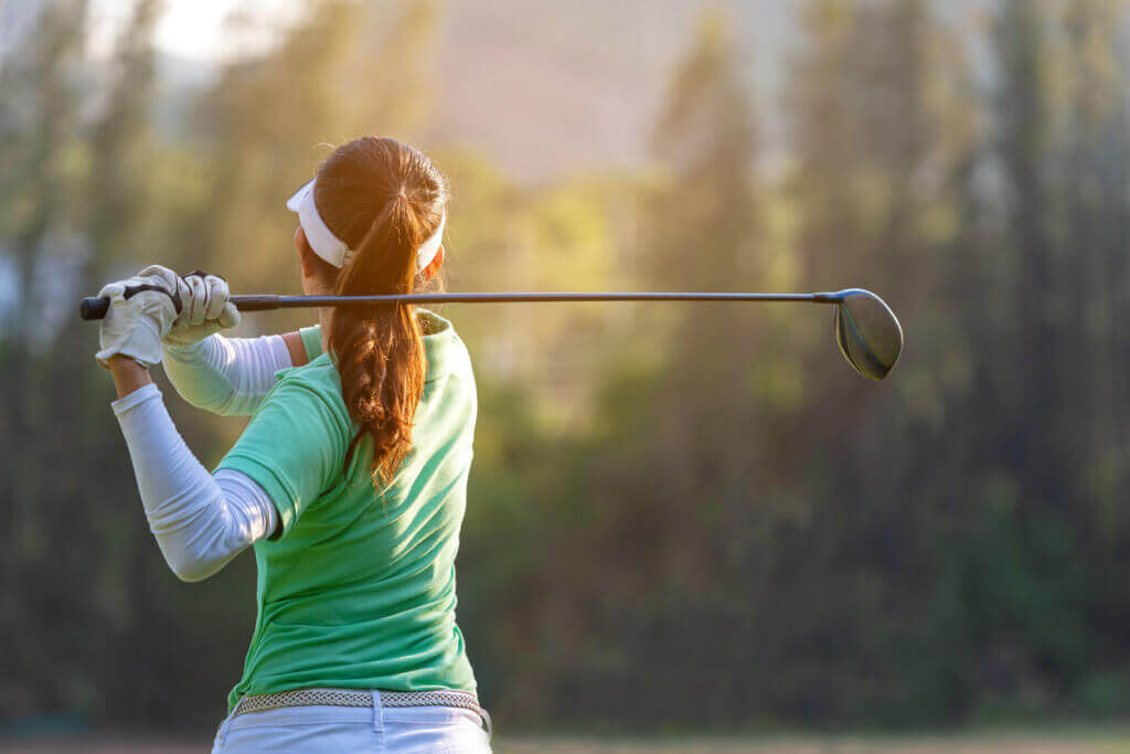 Woman playing golf