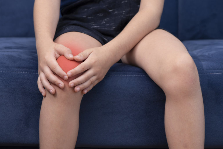 child with knee pain