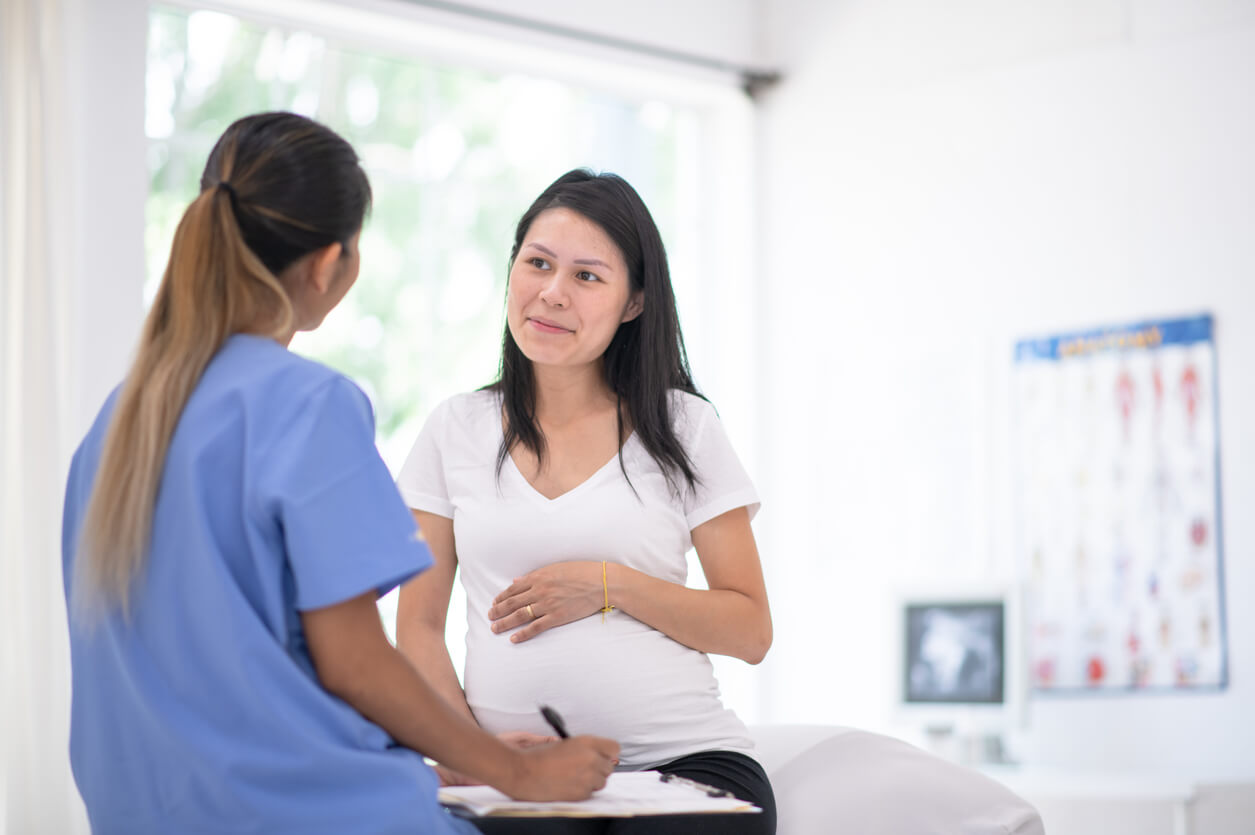 pregnant woman at the doctor