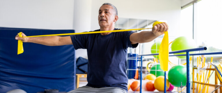 Man performing physical therapy after surgery