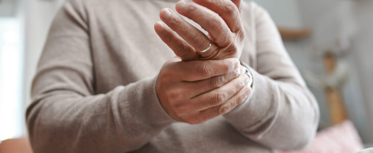 Hands, pain and senior man with arthritis