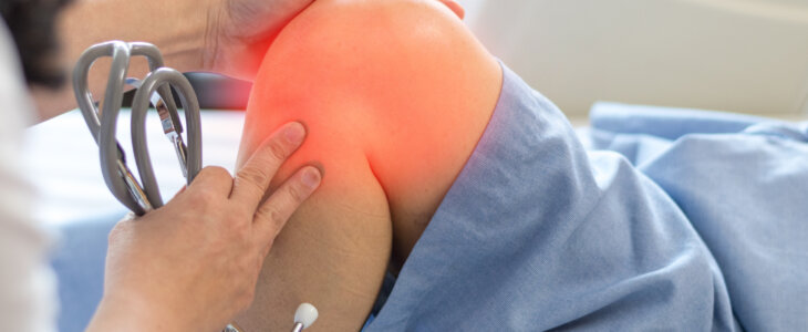 Doctor check up or exam patient knee bone and joint for patellofemoral infection