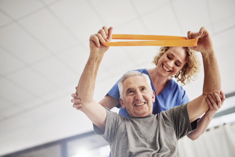 female physician working with a senior patient